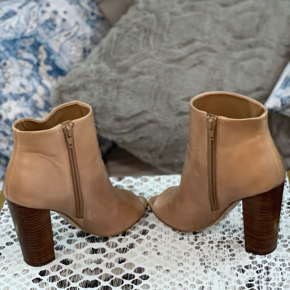 Peep toe leather booties. WORN ONCE. Excellent condition